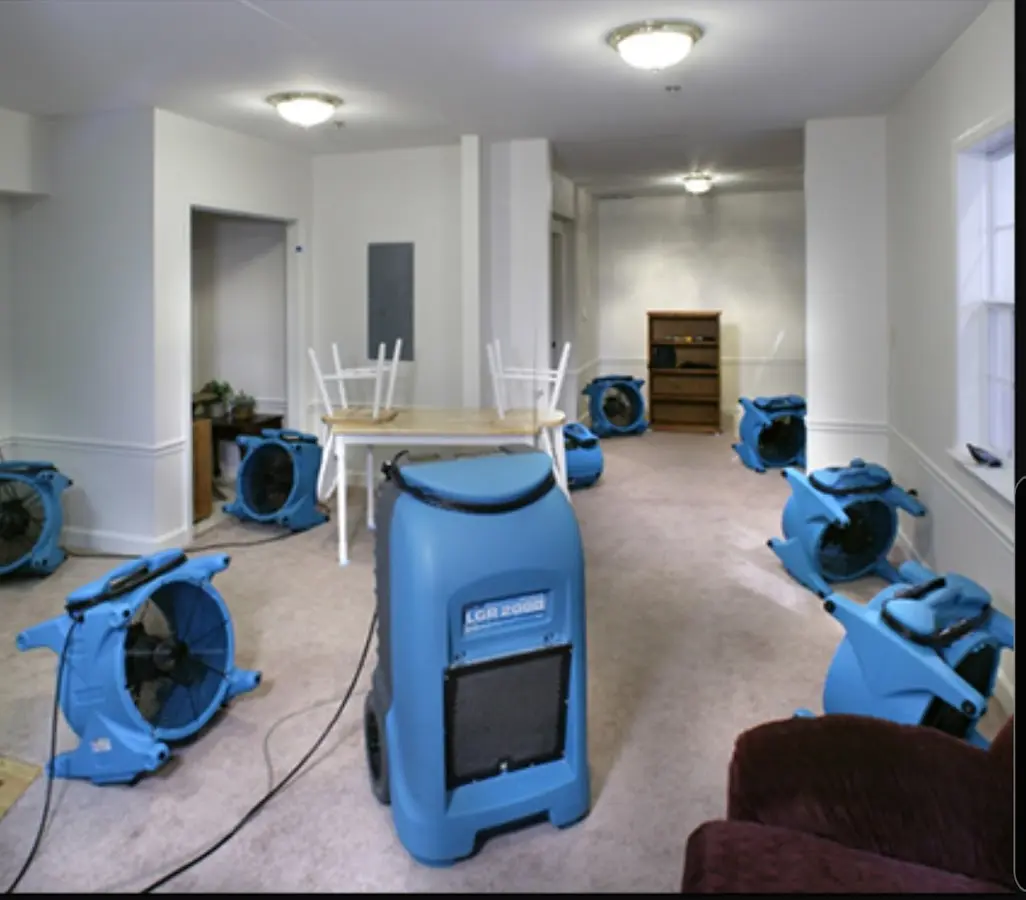 Air movers and dehumidifier setup for Water Damage Restoration in Galt